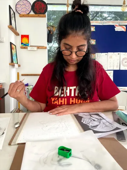A student in our sketching course working on a detailed portrait. The course covers fundamentals like shading, proportion, and texture.