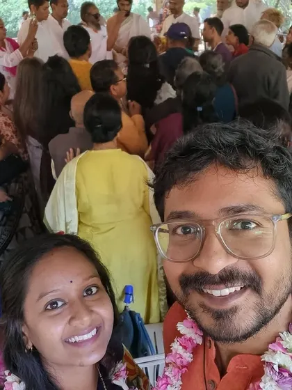 A happy anniversary selfie of Harikrishna and Akanksha, who met through our platform. Their smiles in front of Gurudev's kutir show a love story that continues to blossom in grace.