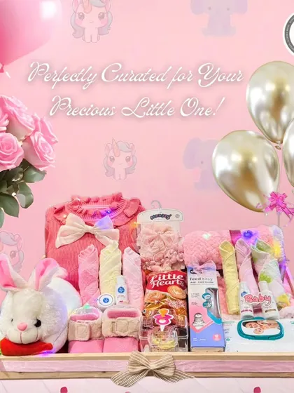 Perfectly curated for your precious little one. This pink-themed baby girl hamper is filled with an outfit, a soft bunny toy, hair accessories, and other adorable essentials.