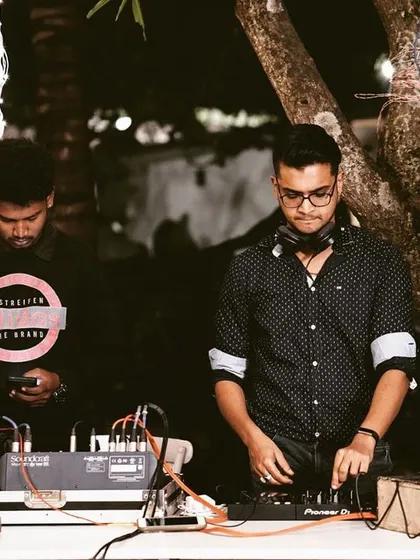 At the decks during an outdoor event at Farmhouse Social. I'm comfortable in any setting, bringing great music and good vibes to the party.