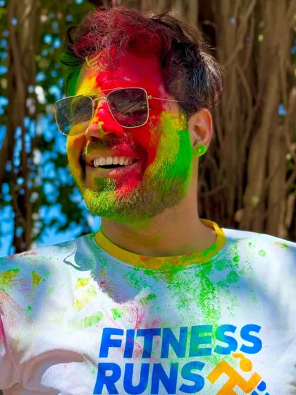 Another shot from the Holi celebration, sunglasses on, enjoying the moment. These events are all about letting go and embracing the festive chaos.