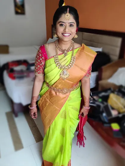 This is one of the final looks for Vaishnavi. The vibrant lime green saree was chosen after her personal color analysis, ensuring she looked fresh and glowing. This photo captures the confidence that comes from feeling truly yourself.