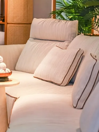 The plush, high-density foam cushions of the Montserrat Sofa invite you to unwind. The thoughtful details, including the adjustable headrests and premium fabric, reflect our dedication to creating furniture that is as comfortable as it is beautiful.