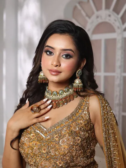 Thinking about joining our academy? We offer detailed demonstrations, hands-on practice, and a professional portfolio shoot to ensure you are fully prepared for a successful career. This look is an example of the sangeet and reception glam you will learn to create.