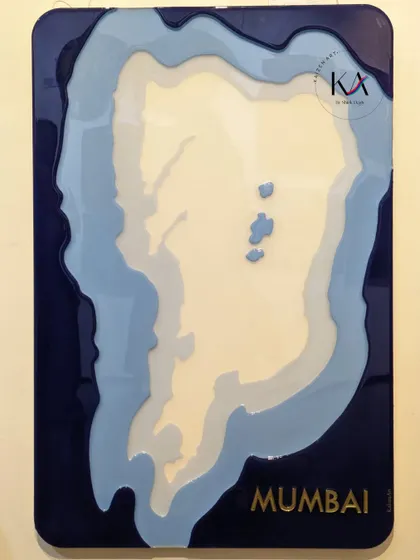 A full view of my conceptual artwork, "The Bird Eye," an aerial map of Mumbai. This 3 by 2 feet piece is made with layered resin on a thick MDF base and makes for a powerful statement wall art.