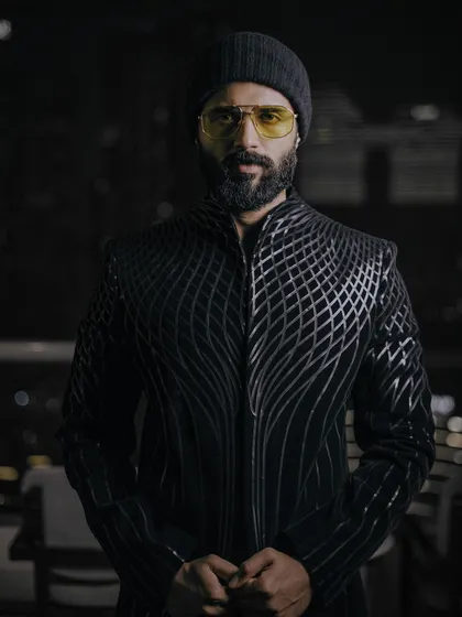 For this look, I styled Vijay Deverakonda in a futuristic bandhgala by Amit Aggarwal. The metallic, structured detailing and yellow-tinted glasses create an edgy, high-fashion statement.