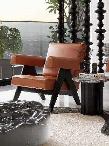 Detail is paramount in our work. In the Renaissance Bellevue penthouse, we curated every element, from the iconic Pierre Jeanneret-style armchair to the textures of the marble and rug, to create a refined and sophisticated urban retreat.