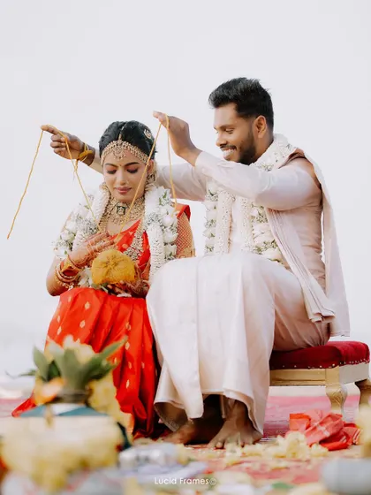 The sacred moment of the thaali tying, a key ritual in a South Indian wedding.