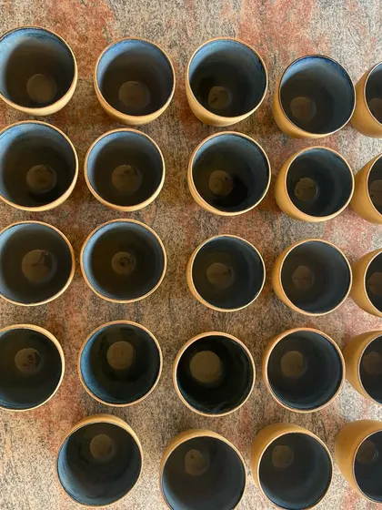 I love the beautiful imperfections that can happen during firing. This batch of stoneware cups and plates came out with a stunning, deep blue glaze that has so much character.