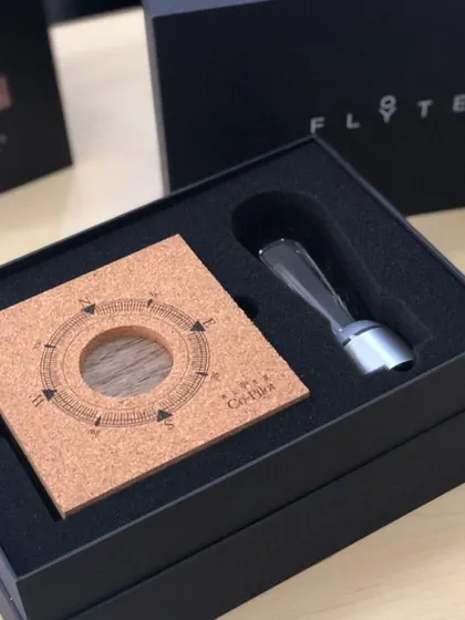 An inside look at the FLYTE packaging, showing the custom-fit foam that protects each component. This image reveals the cork setup guide, a thoughtful detail that enhances the user experience.