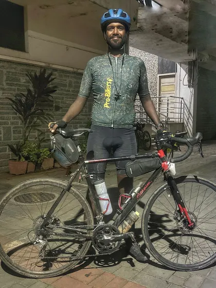 A finisher of the Jog Falls 1000K BRM, exhausted but proud. This image captures the raw emotion of completing a 1000km ultra-endurance event.