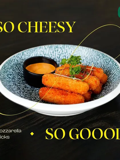 So cheesy, so good. Our mozzarella sticks are the ultimate comfort snack, served with a tangy dipping sauce.
