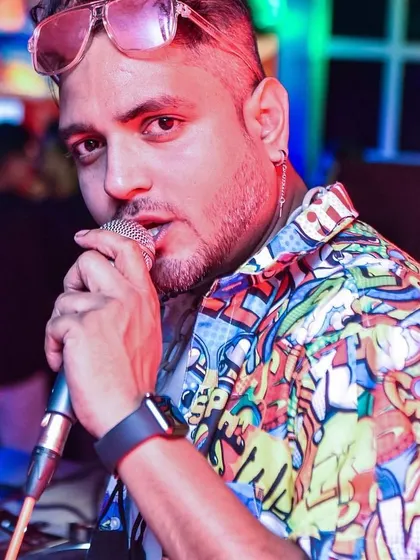 On the mic and on the decks at Howln Pub. I don't just play music; I host the party, making sure everyone in Namma Bengaluru feels the Bollywood vibe.