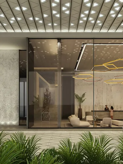 The driveway and lobby entrance of the Worli commercial headquarters. Spanning an impressive 512,350 sq. ft., this monumental building is designed to epitomize both elegance and the resilient quality of the brand it houses.