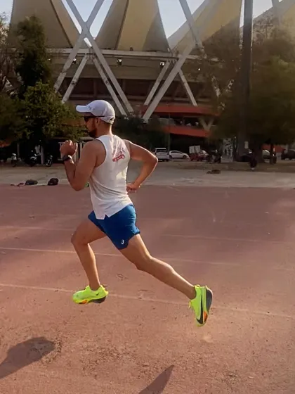 Track days are my favorite. This runner is demonstrating excellent form during a speed workout. The track is where we build raw speed.