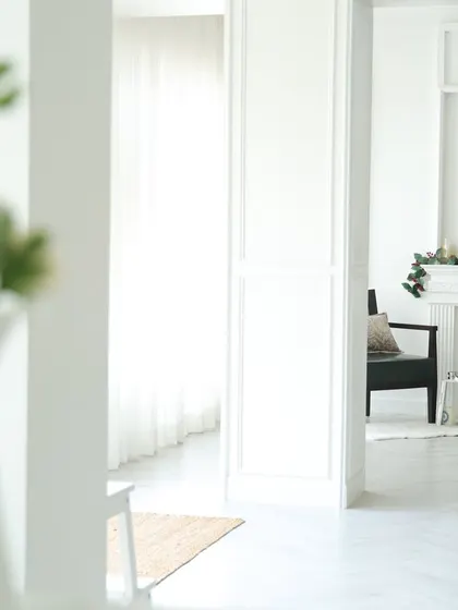 A glimpse of our decorative fireplace corner, complete with a classic gilded mirror. This section of the studio adds a touch of European elegance and sophistication to any shoot.
