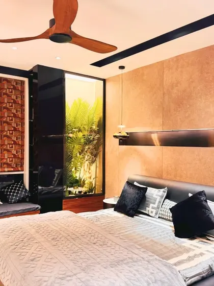 Another view of the Paschim Vihar bedroom, showcasing the built-in seating nook by the window. This cozy corner provides a perfect spot for reading or enjoying a cup of tea.