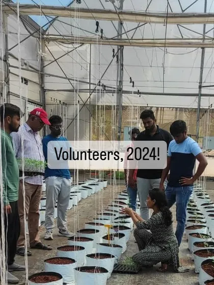 Volunteers receiving instructions before getting started. Volunteering is an opportunity to learn about hydroponics and contribute to the farm's success.