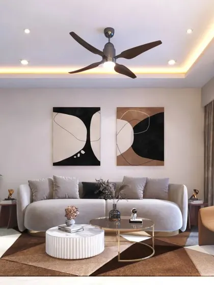 This living room design uses a neutral color palette with geometric patterns on the rug and cushions to create a sophisticated and visually interesting space.