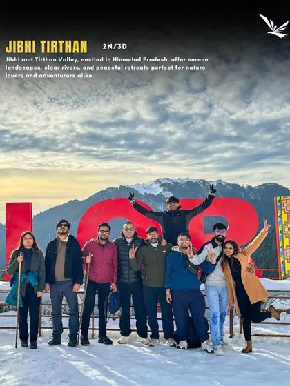 Our group celebrating in front of the iconic 'I Love Jibhi' sign. This 2-night, 3-day trip to Jibhi and Tirthan Valley is a perfect peaceful retreat for nature lovers and adventurers.