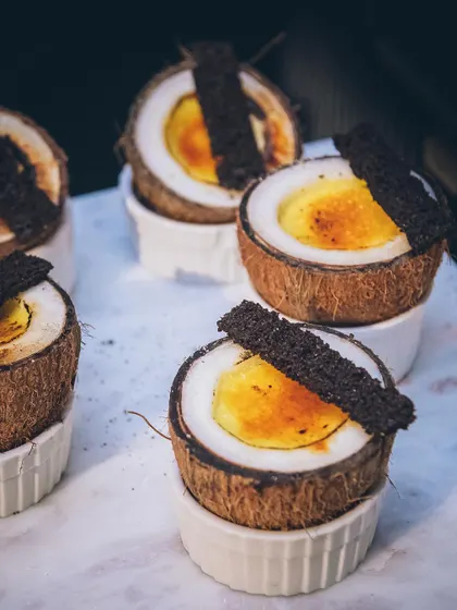 Our signature tender coconut dessert, creatively served in a natural coconut shell.