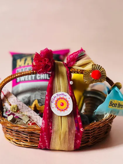 Another angle of the wicker basket Rakhi hamper, showing the festive and traditional wrapping style.