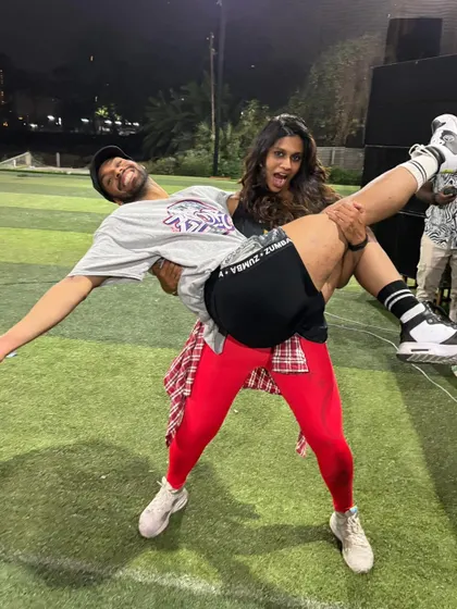 Who's lifting who? Just having some fun and showing off our strength after an intense session.