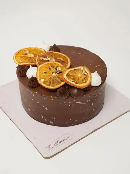 The full Zesty Orange Chocolate Cake, featuring moist chocolate sponge soaked in fresh orange juice and an orange zest-infused ganache.