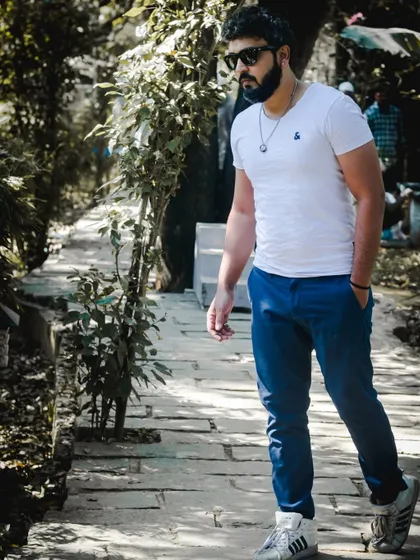 A candid self-portrait, walking through a park. This is me on the move, always observing and looking for photo opportunities.