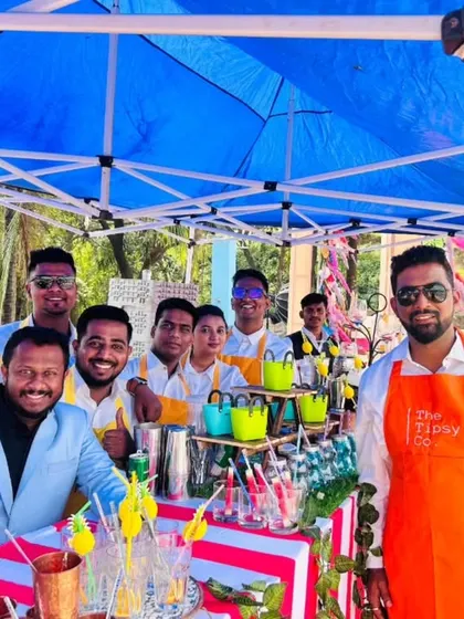 The whole crew together at a colorful outdoor brunch event. Our team works together seamlessly to ensure service is fast, friendly, and fun.