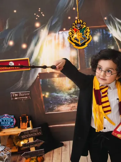 Mischief managed. For all the little wizards out there, my Harry Potter themed shoot is a dream come true. With a Gryffindor scarf, a magic wand, and a backdrop that feels straight out of Hogwarts, we can create some truly enchanting portraits.