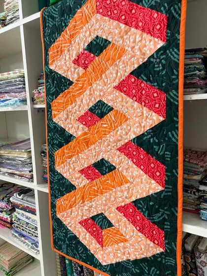 An angled view of the 3D quilt, enhancing its optical illusion effect.