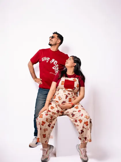 A cool and stylish pose from our casual studio session. We love it when couples bring their unique personalities to the shoot.