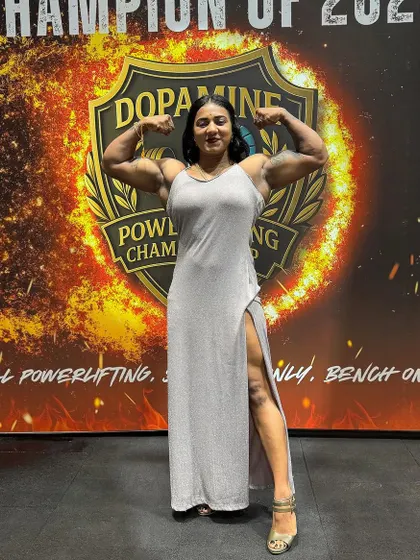 On stage at the Dopamine Powerlifting Championship, this moment captures the vision and confidence that comes from achieving your goals. My journey has given me a platform to inspire others, and I bring that same champion mindset to our coaching partnership.