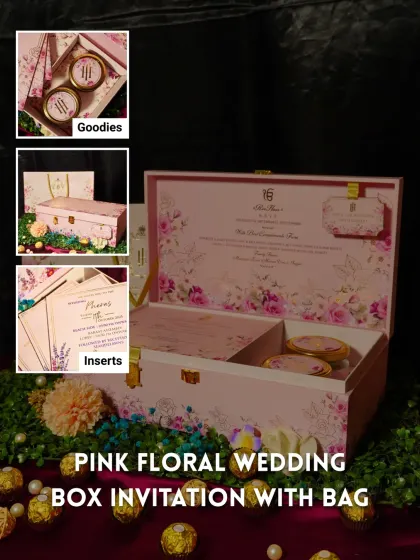 A beautiful pink floral wedding box that comes with its own matching bag. This design includes custom inserts and compartments for treats, blending traditional gifting with elegant invitation design.