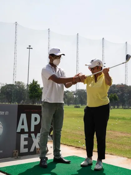 Helping a student feel the correct extension in their arms during the backswing. This is key for generating power and width in the swing.