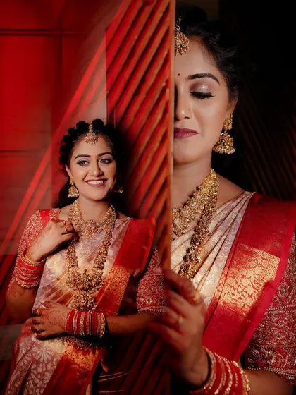 A creative portrait of the bride, using a red, textured foreground to create a unique and artistic effect.