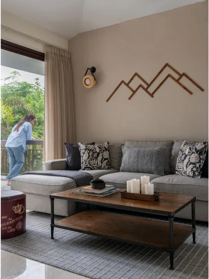 Another image from the Interior Lover feature, showcasing a cozy lounge area with mountain-inspired wall art, reflecting the personalized and thoughtful details we bring to each project.