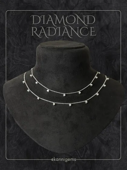 A studio shot of the double-layered diamond necklace on a bust, highlighting its elegant drape and sparkle. This piece is crafted to shine with you, whether worn solo or layered.
