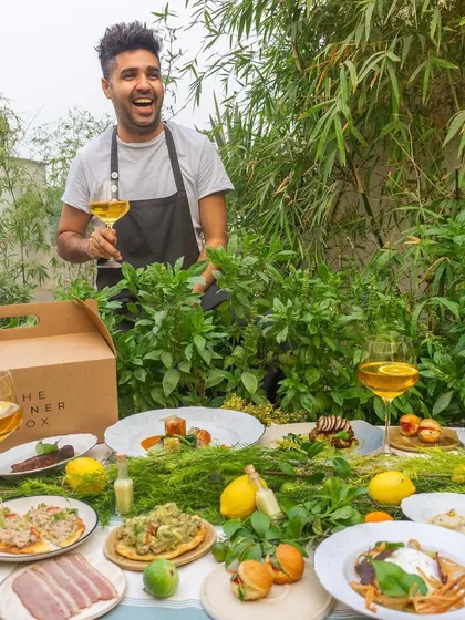 We partner with culinary masters like Chef Dhruv Oberoi to bring you exclusive menus. This image captures the joy and abundance of his 'An Italian Affair' spread, highlighting the passion and expertise behind every dish we offer.