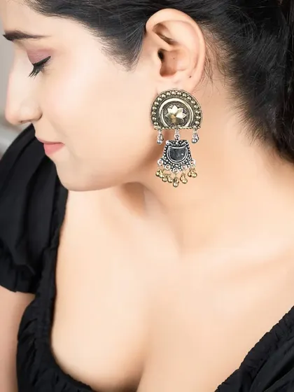 A detailed photograph of traditional jhumka-style earrings. My jewellery photography is sharp and clear, perfect for e-commerce product pages.