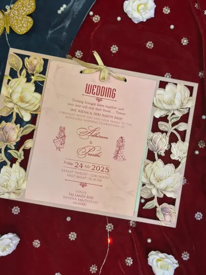 Craftsmanship is in the details. This card features a beautiful laser-cut floral frame, creating a stunning 3D effect that surrounds the main wedding insert. It's a testament to how modern techniques can elevate traditional design.