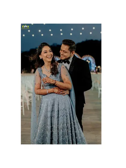 This portrait captures the fun and mischievous energy of Dhwnai and Niraj. Their laughter is a testament to the joy they find in each other's company.