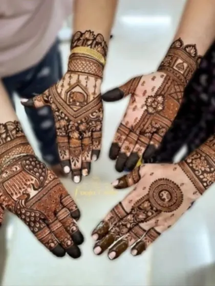 A showcase of coordinated mehandi for the bride tribe. Each hand has a unique yet complementary design, featuring elephants, peacocks, and floral patterns.