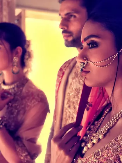 A candid-style shot from the same Shyamal & Bhumika campaign, capturing a quiet moment. This image shows our ability to direct models to create authentic interactions that tell a deeper story.