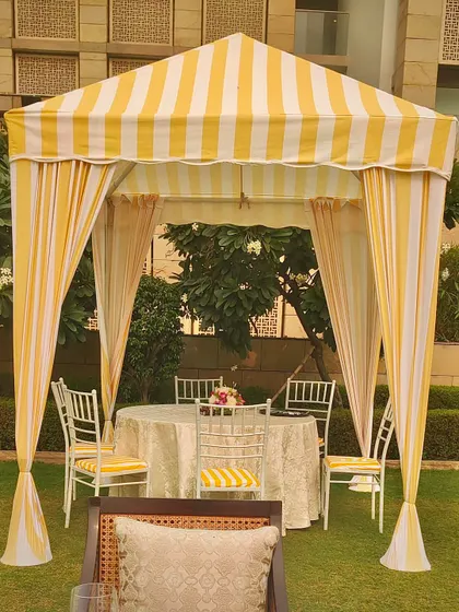 A close-up of one of the private dining cabanas. These intimate spaces are perfect for smaller groups to converse and dine within a larger event.