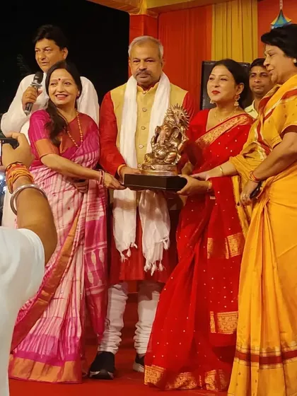 Guru Maa Smt. Ruby Mishra being felicitated at a Diwali Milan event, where we had the opportunity to perform.