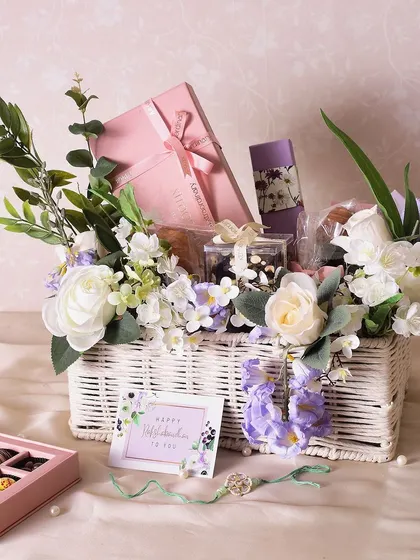 This is my Lavender Treasure Hamper for Rakhi. It’s designed to be a complete sensory experience, combining decadent treats like brownies and bonbons with beautiful flowers and a handcrafted rakhi.