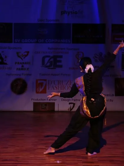 The beautiful lines and form of a classical dance performance.