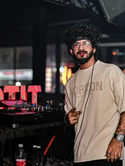 A moment to connect before the beat drops. This is me at my console at Tito's, ready to take the crowd on a musical journey. I bring a professional and cool-headed approach to every event I play.